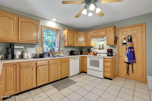 a view of a hallway with entryway
