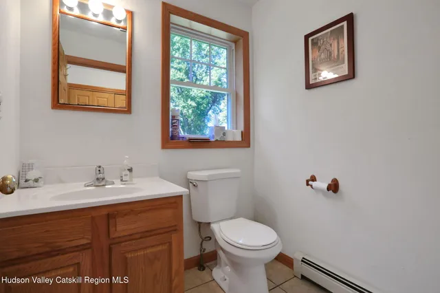 a bedroom with furniture and a chandelier