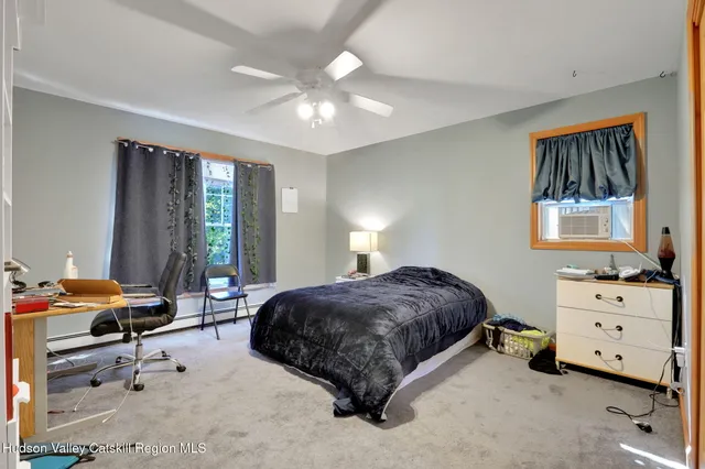 a view of a garage with parked cars