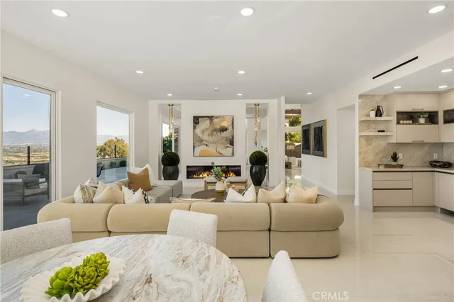 a kitchen with stainless steel appliances granite countertop a sink and cabinets