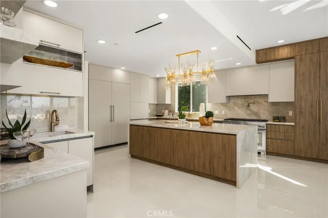 a view of swimming pool with a table and chairs