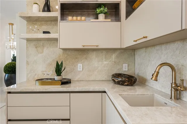 a bedroom with a bed and a potted plant