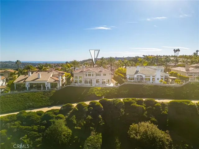 a spacious bathroom with a double vanity sink a mirror a bathtub and a shower