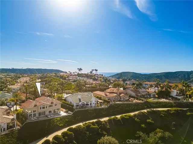 a bathroom with a tub sink a mirror and shower
