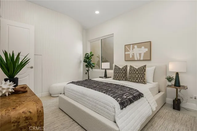 a bathroom with a granite countertop sink a large mirror and a