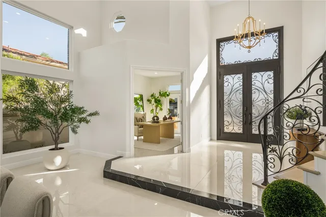a bathroom with a toilet a sink and shower