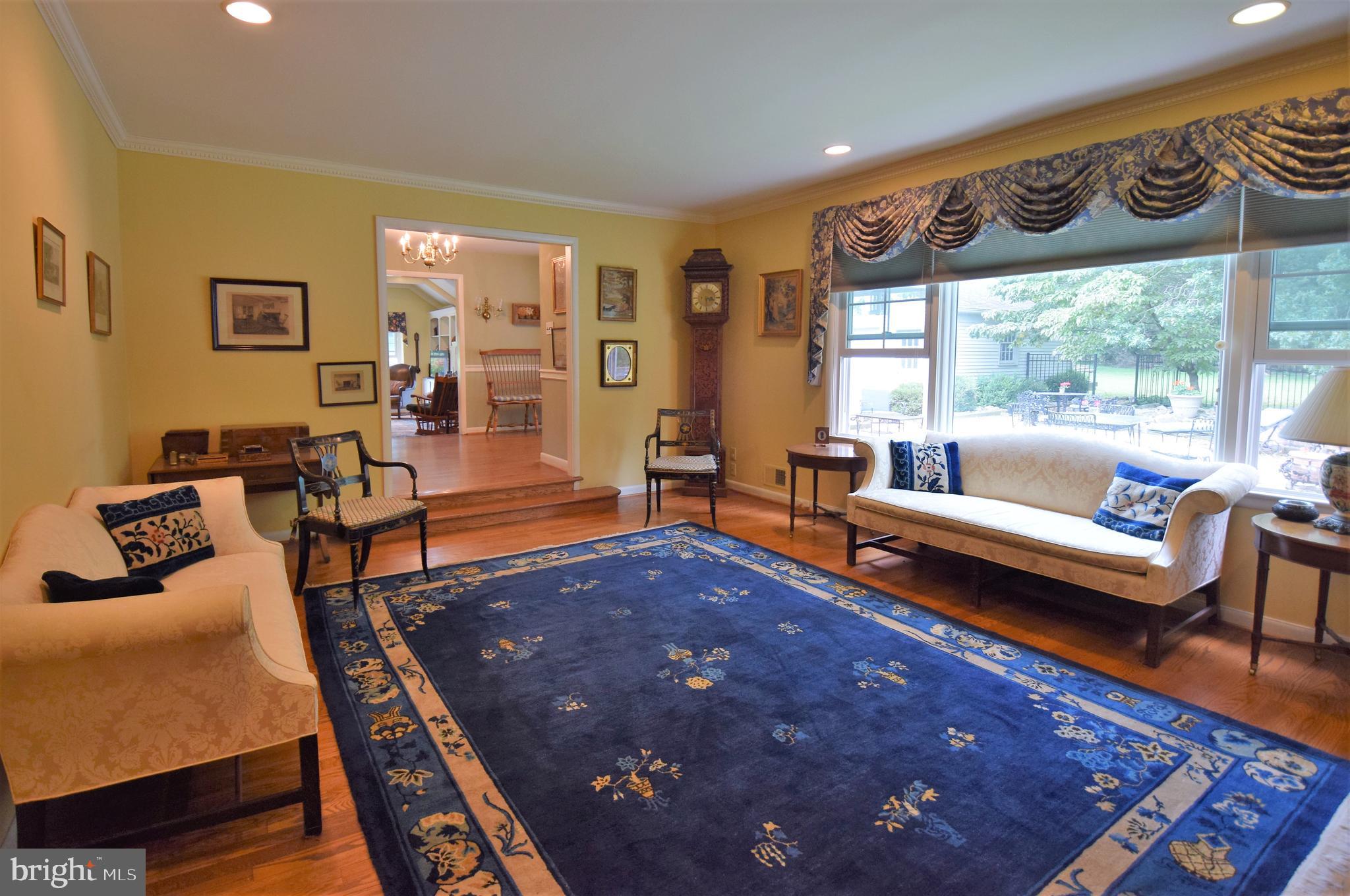 1550 Glenhardie Road Wayne, PA 19087 - Photo 12 of 38 a living room with furniture and a large window