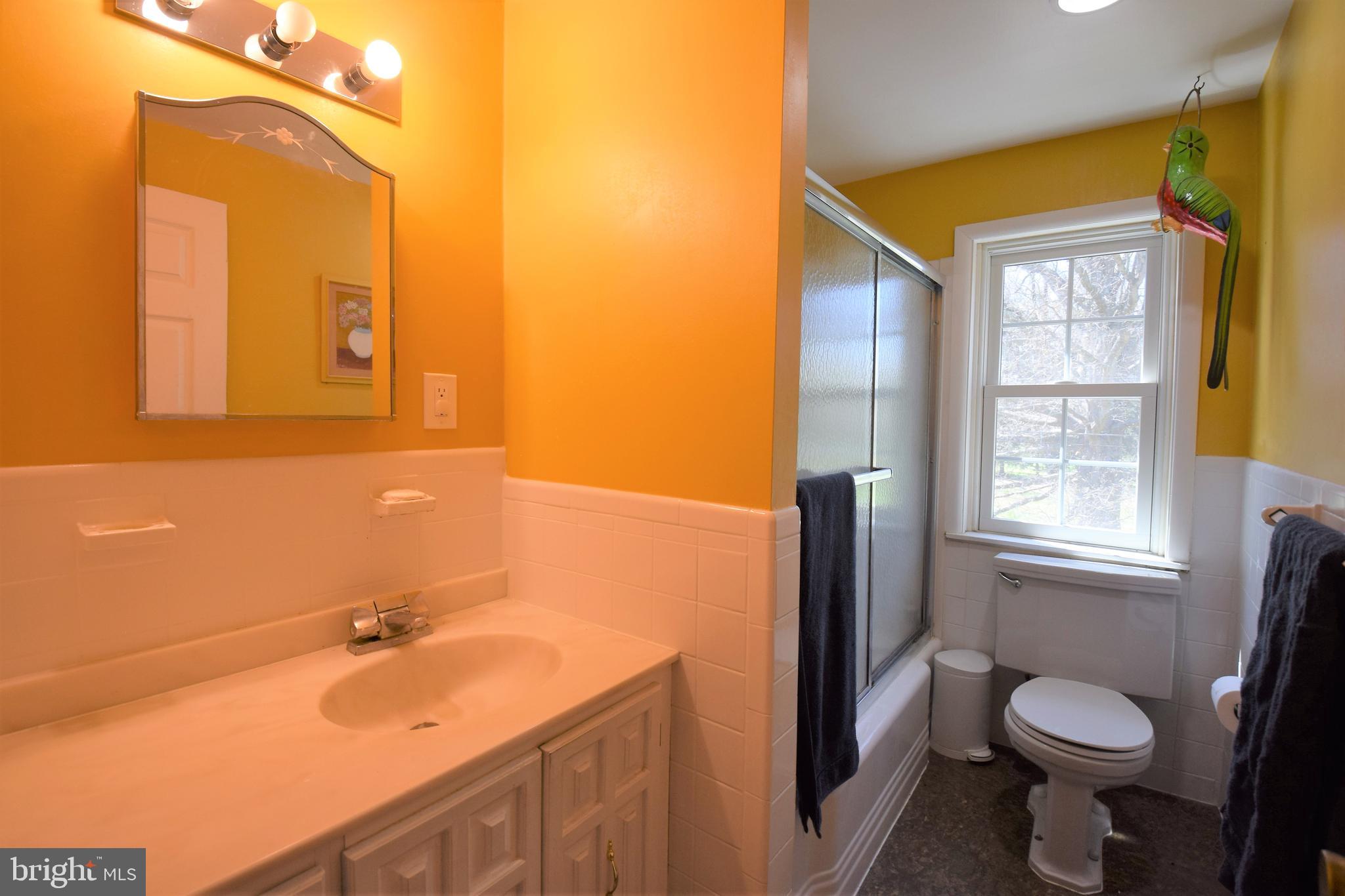 1550 Glenhardie Road Wayne, PA 19087 - Photo 22 of 38 a bathroom with a sink and a mirror