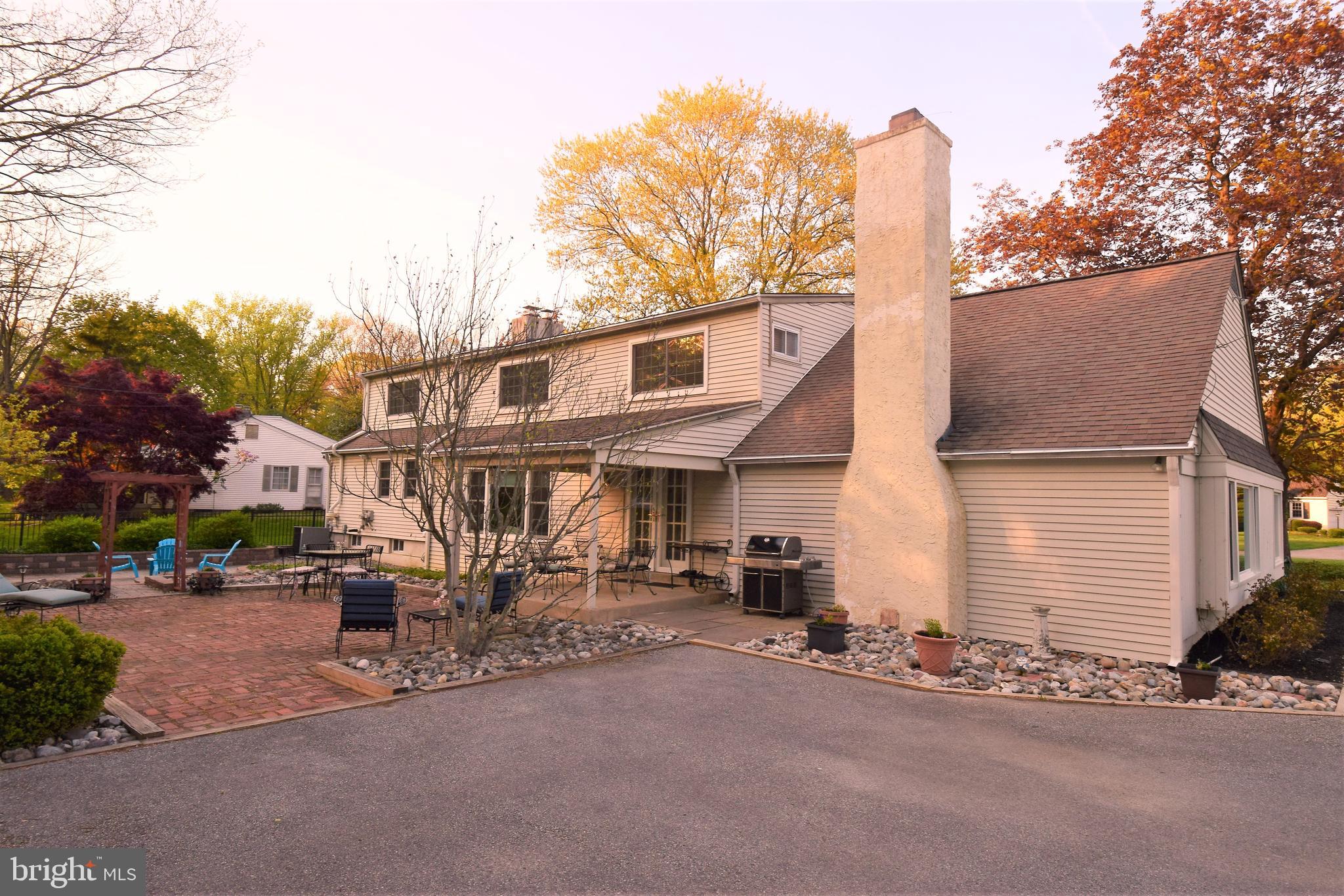 1550 Glenhardie Road Wayne, PA 19087 - Photo 23 of 38 a street view with tall buildings and a street
