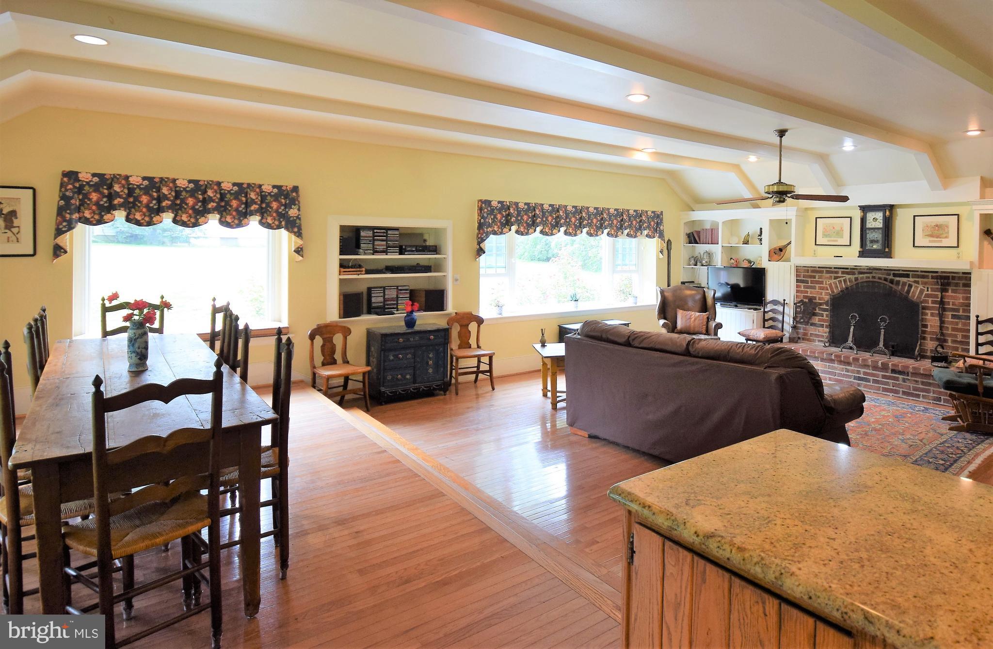1550 Glenhardie Road Wayne, PA 19087 - Photo 32 of 38 a living room with furniture kitchen view and a large window