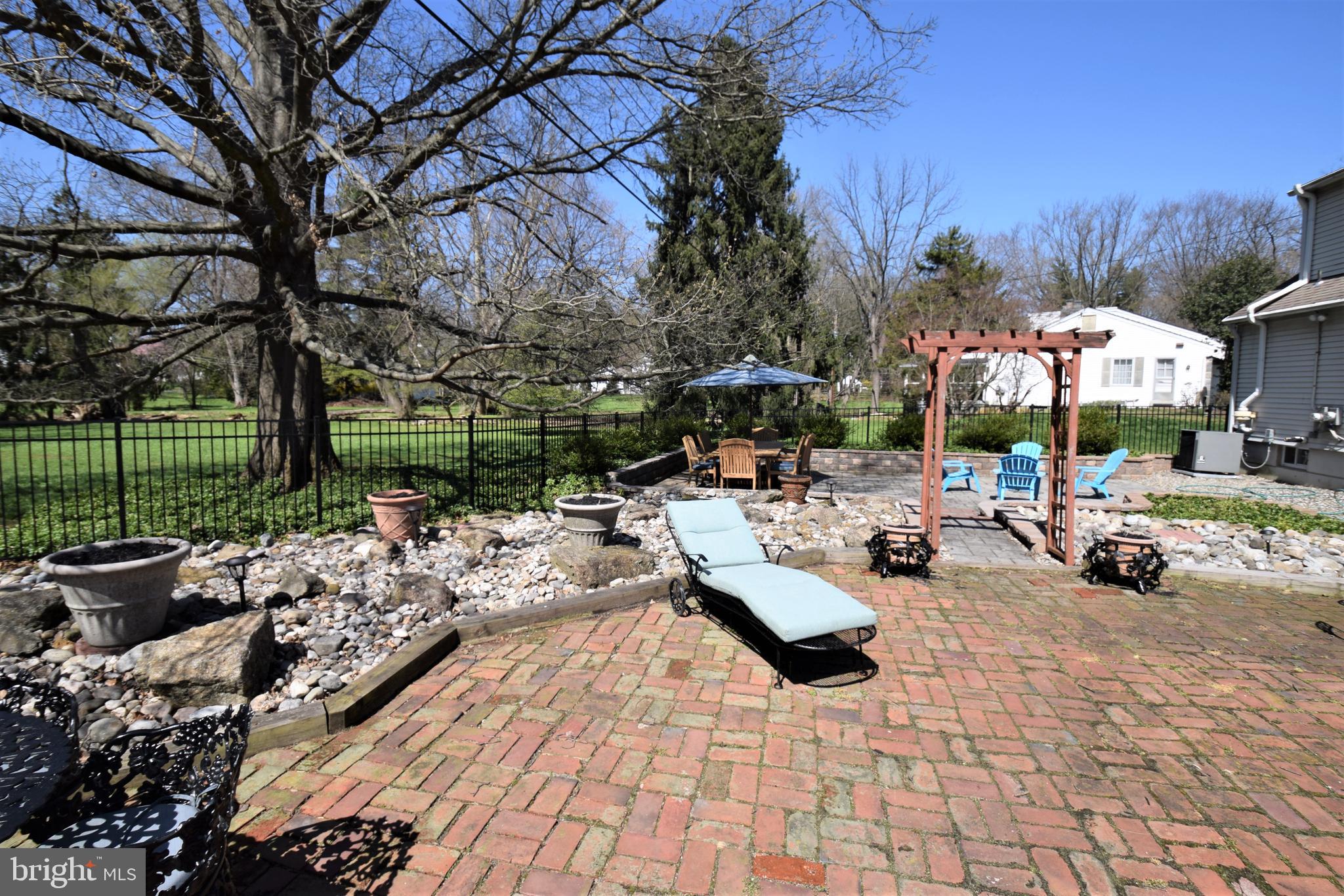 1550 Glenhardie Road Wayne, PA 19087 - Photo 36 of 38 a view of a couch and tables in the patio
