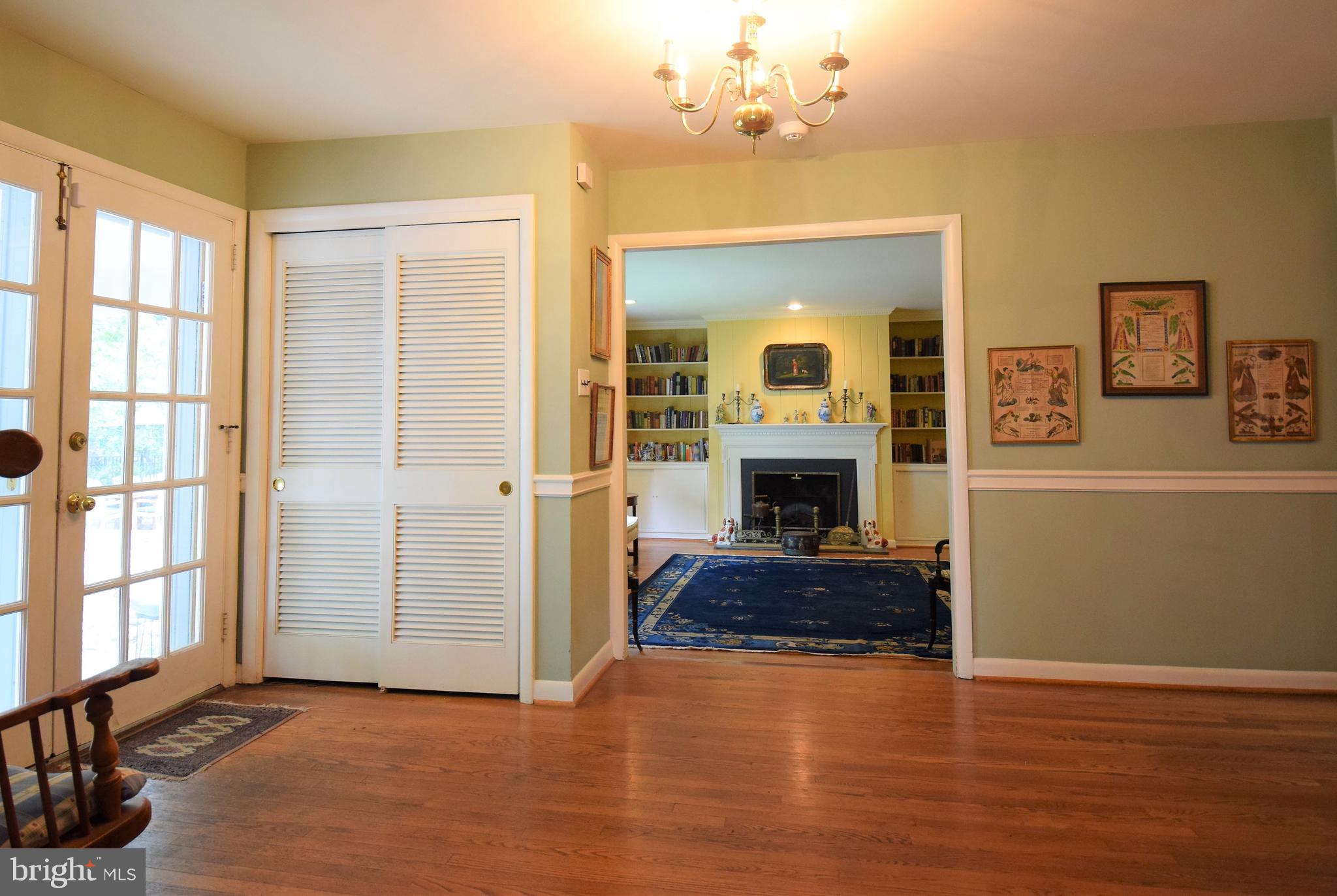 1550 Glenhardie Road Wayne, PA 19087 - Photo 10 of 38 a view of a livingroom with wooden floor and a fireplace