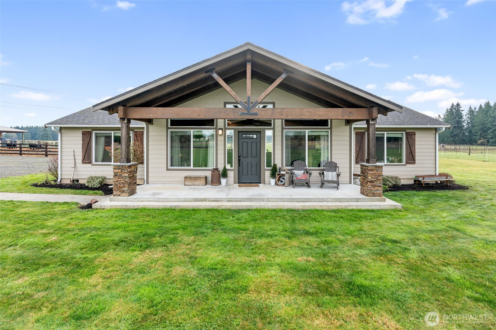 a front view of a house with a yard