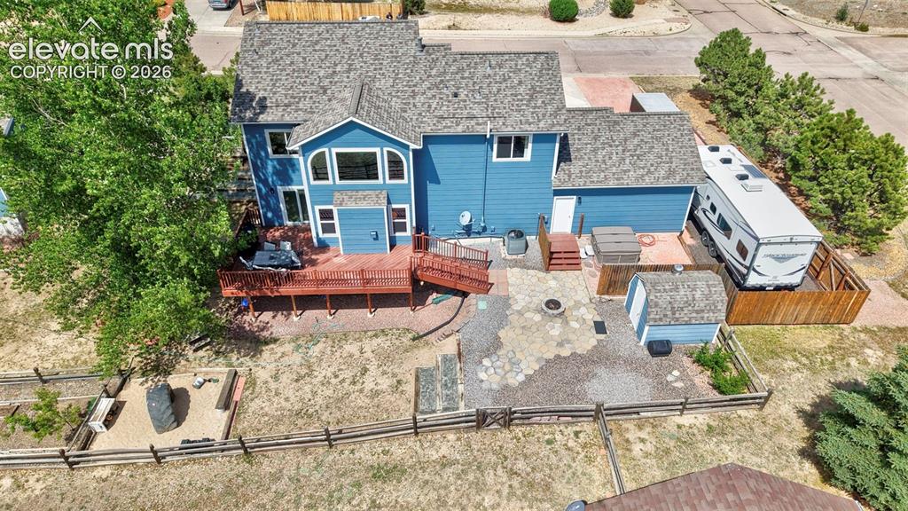 12571 Scamper Road Peyton, CO 80831 - Photo 43 of 49 Huge Mature Trees in Backyard + Deck