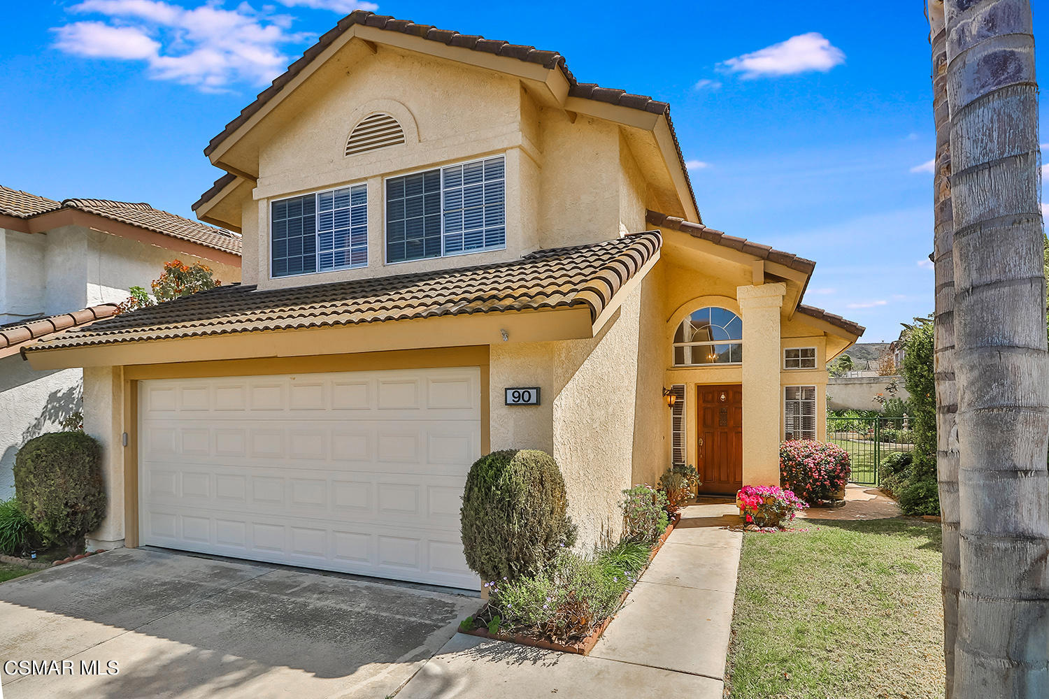 90 Valley Crest Road Simi Valley, CA 93065 - Photo 1 of 19 a front view of a house with garden