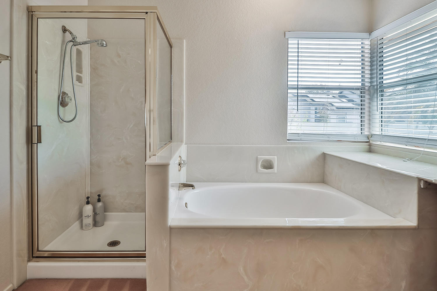 90 Valley Crest Road Simi Valley, CA 93065 - Photo 14 of 19 a bathroom with a bathtub and a shower