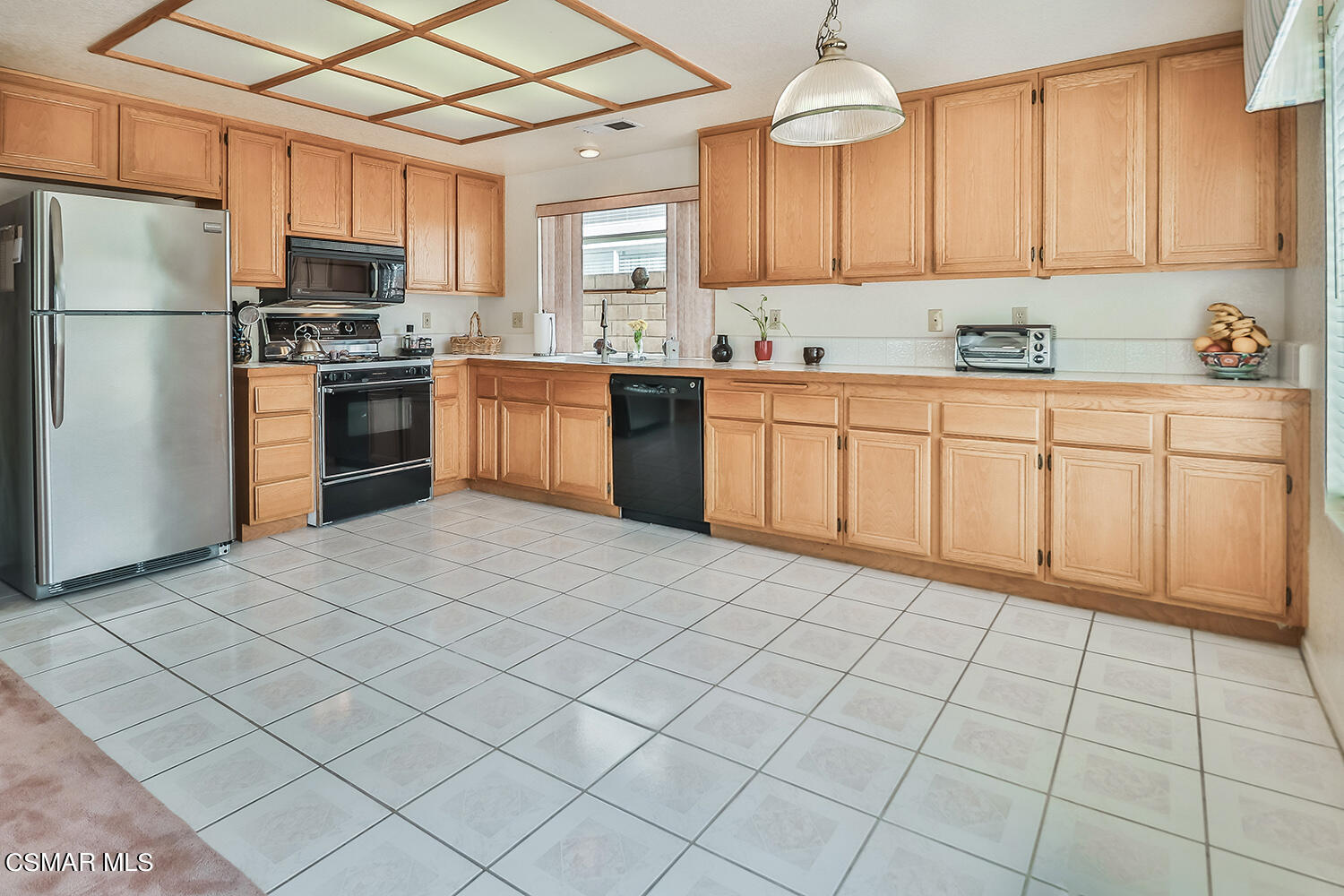 90 Valley Crest Road Simi Valley, CA 93065 - Photo 4 of 19 a kitchen with stainless steel appliances granite countertop a refrigerator sink and cabinets