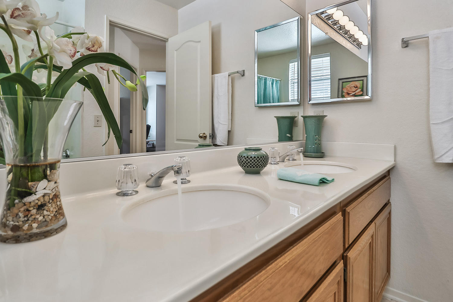 90 Valley Crest Road Simi Valley, CA 93065 - Photo 8 of 19 a bathroom with a granite countertop sink and a mirror