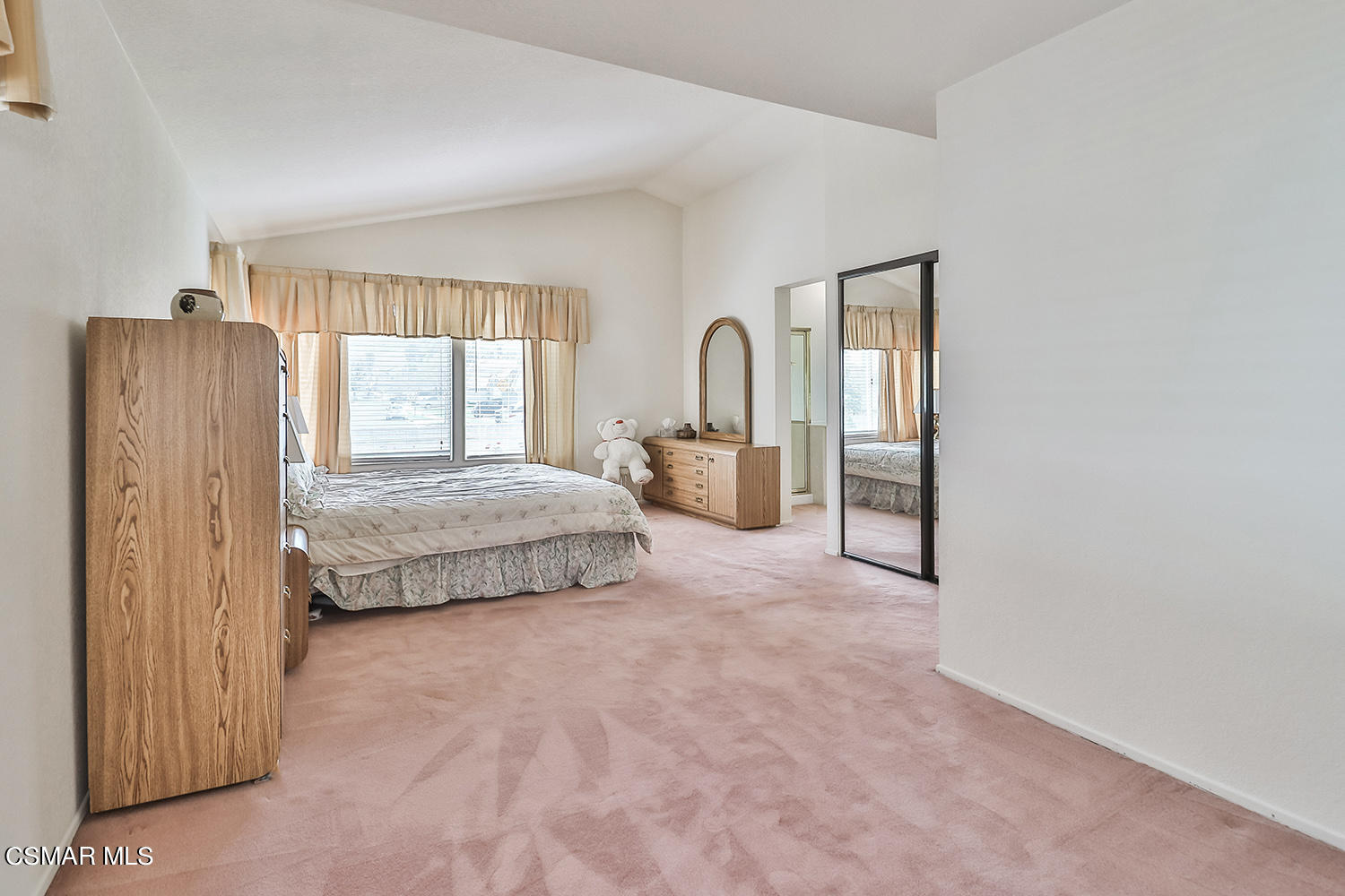 90 Valley Crest Road Simi Valley, CA 93065 - Photo 10 of 19 a spacious bedroom with a bed and large windows