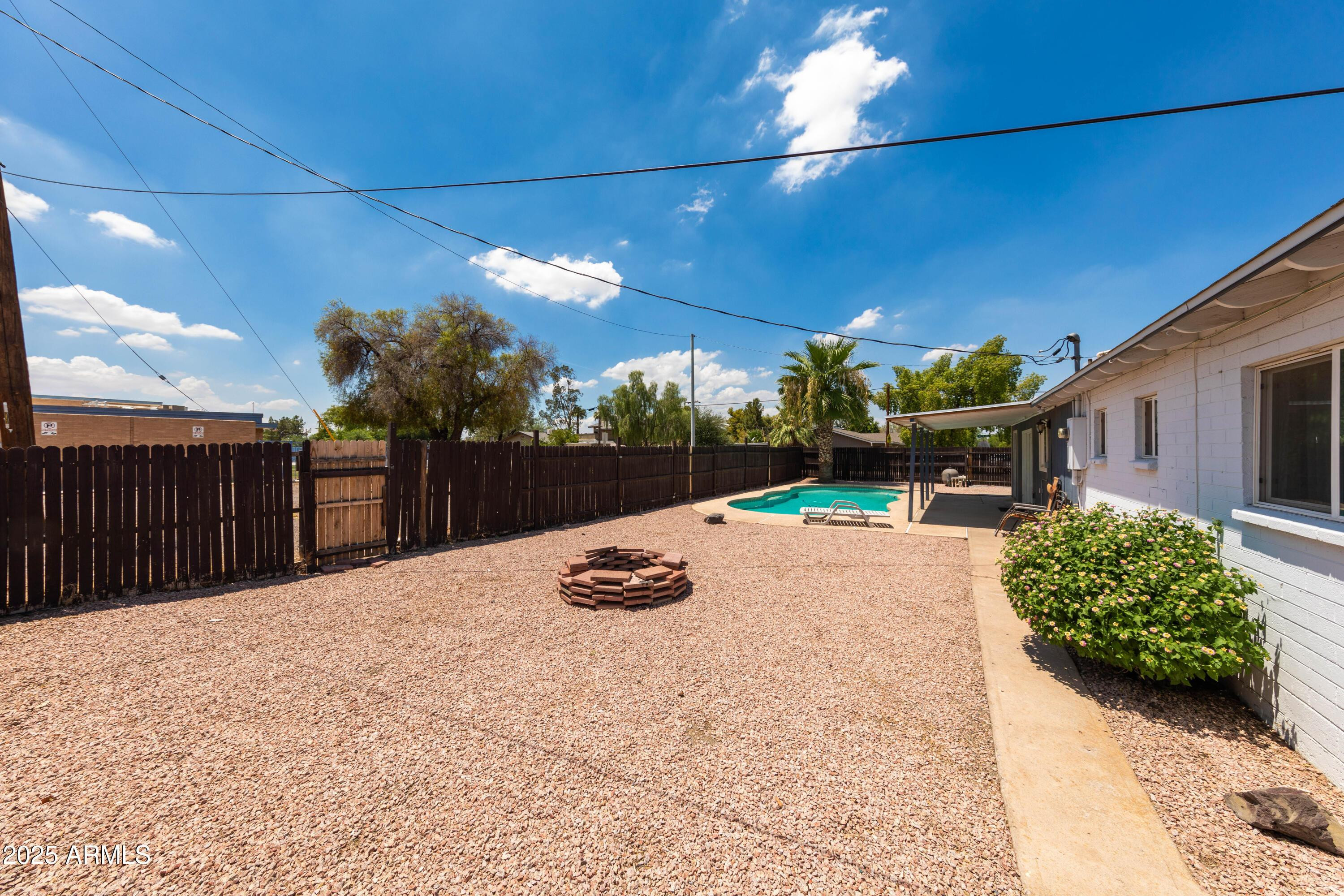 1149 West 10th Street Tempe, AZ 85281 - Photo 19 of 19 a view of a backyard with sitting area