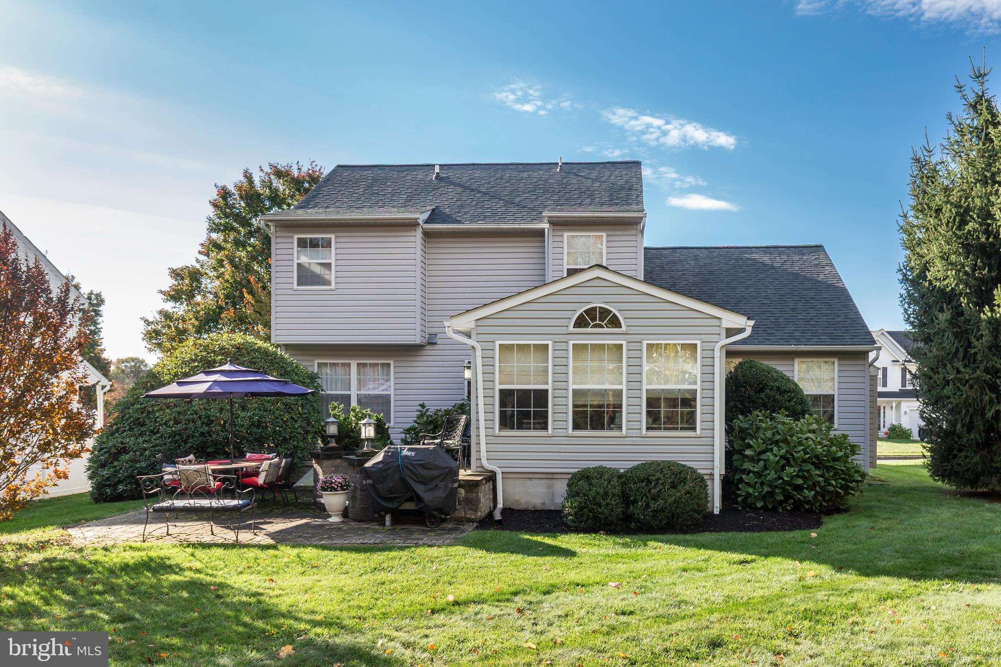 3992 Terrace Drive Hampstead, MD 21074 - Photo 3 of 10 a front view of a house with a yard