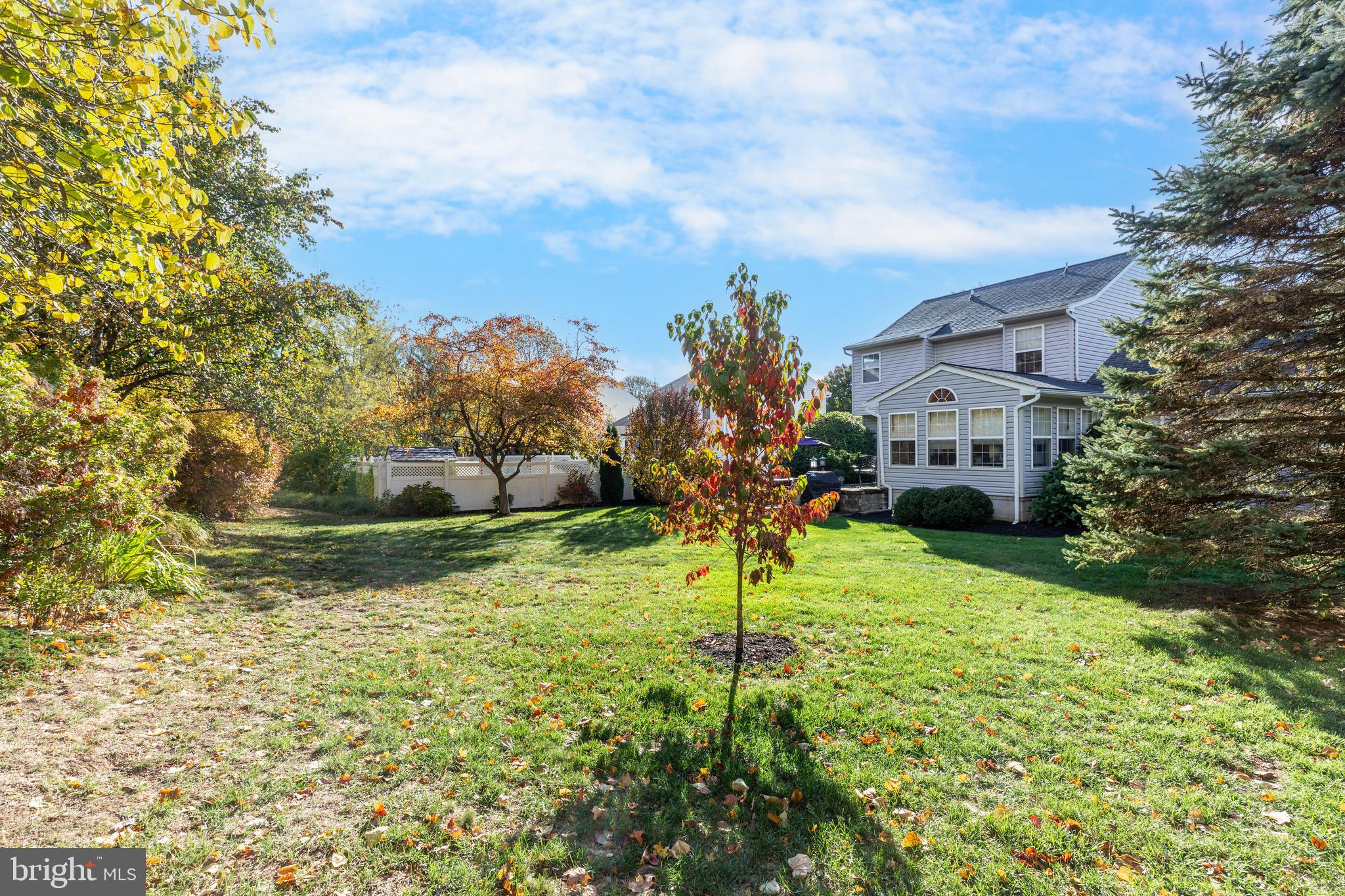 3992 Terrace Drive Hampstead, MD 21074 - Photo 8 of 10 a backyard of a house with a yard and seating space