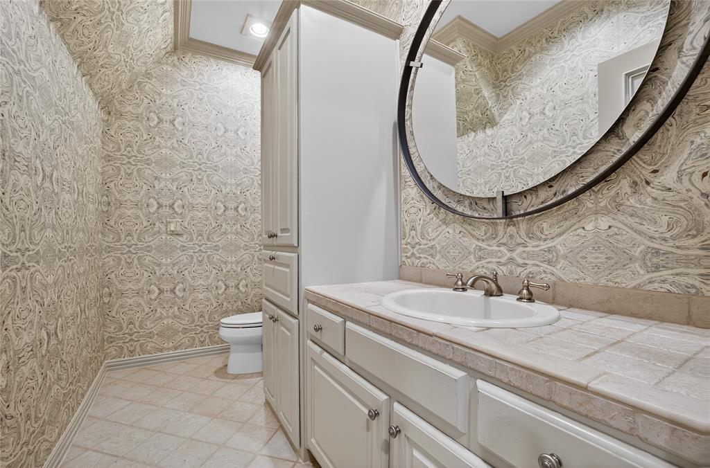 11836 Preston Brook Place Dallas, TX 75230 - Photo 30 of 40 Bathroom featuring wallpapered walls, vanity, and recessed lighting