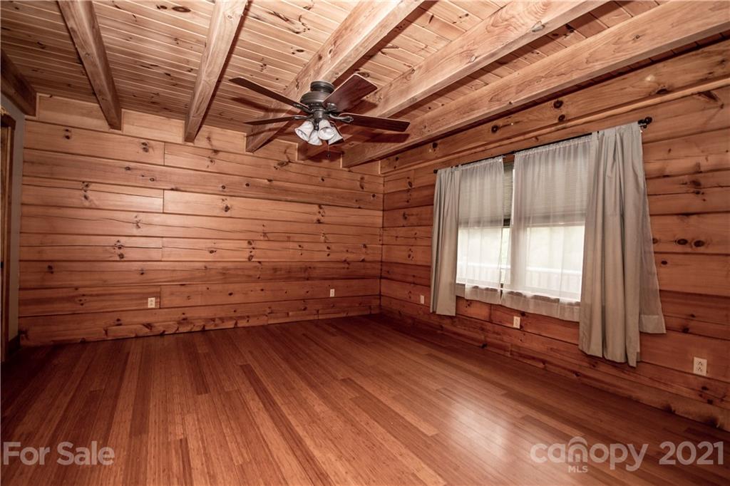 175 Buckeye Branch Drive Clyde, NC 28721 - Photo 15 of 23 a view of a room with wooden floor