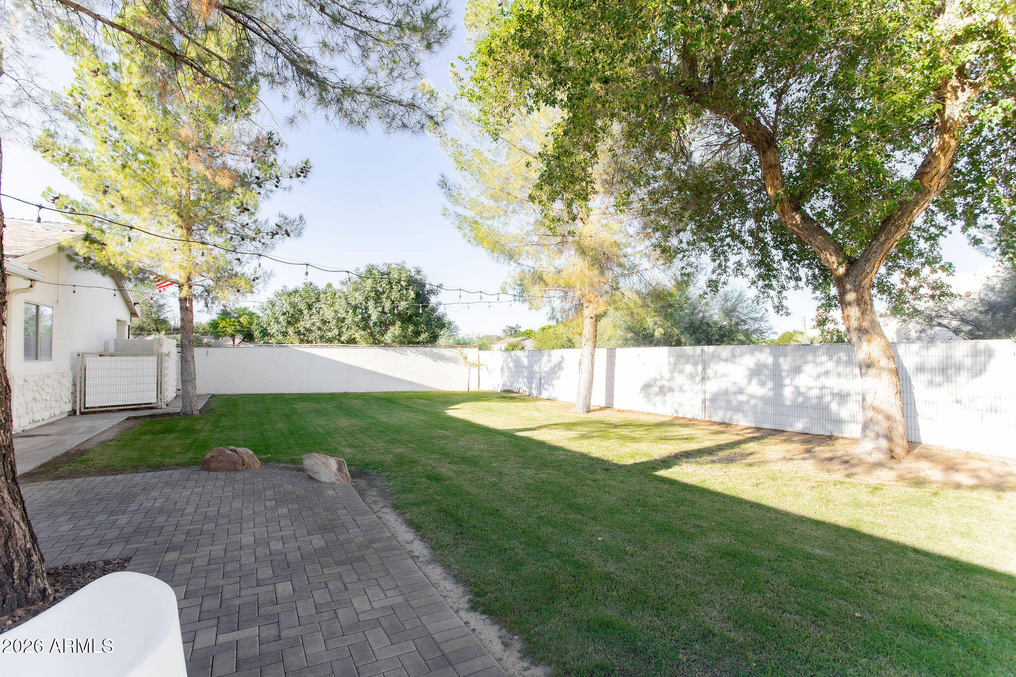 19049 East Cloud Road Queen Creek, AZ 85142 - Photo 54 of 75 a view of a backyard with large trees