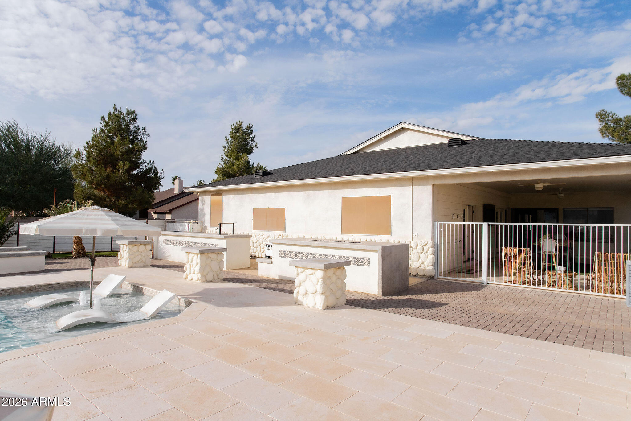 19049 East Cloud Road Queen Creek, AZ 85142 - Photo 66 of 75 a front view of a house with a patio