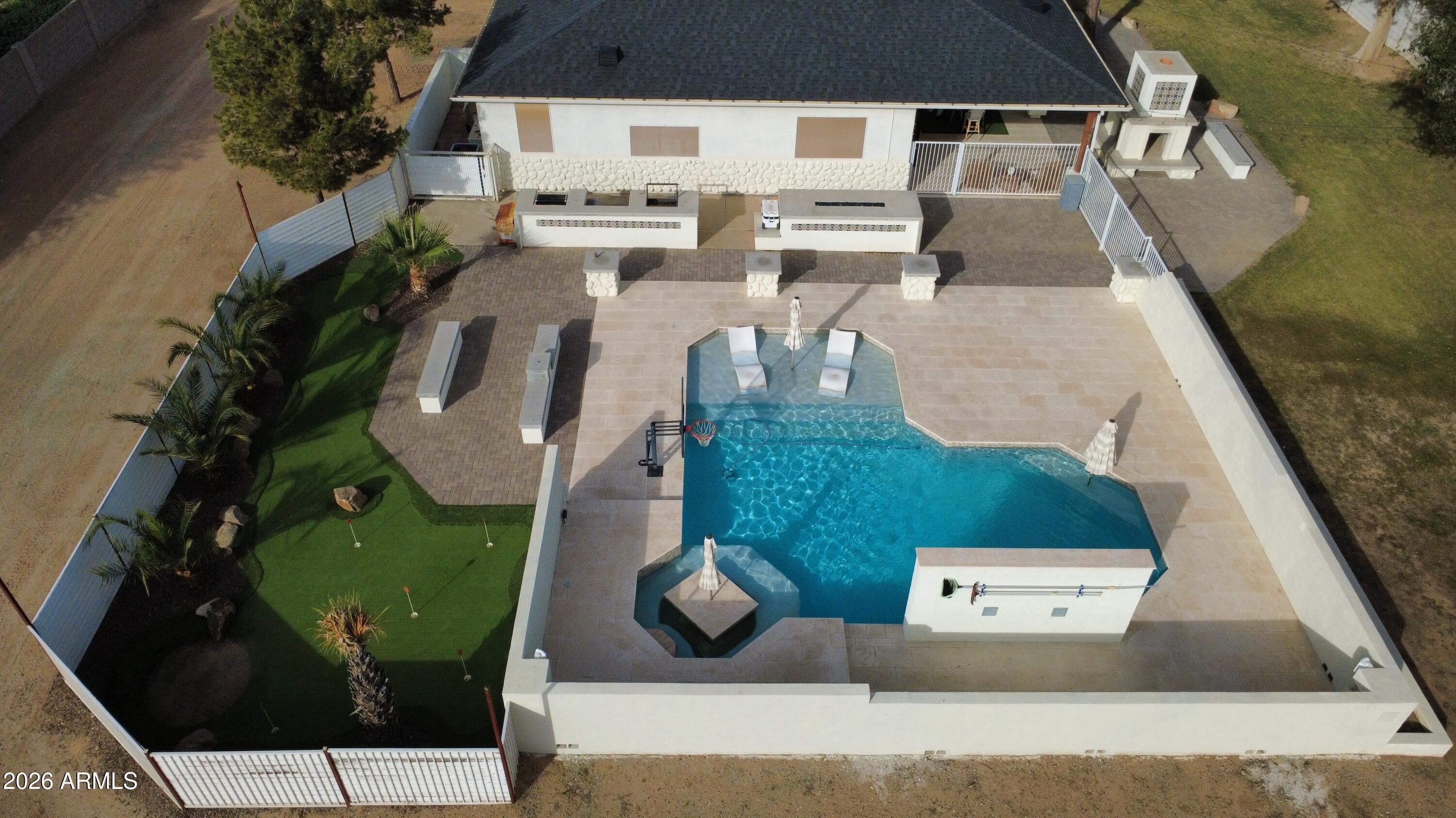 19049 East Cloud Road Queen Creek, AZ 85142 - Photo 67 of 75 an aerial view of a house with garden space and sitting area