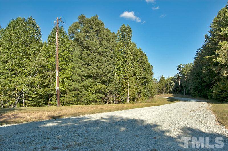 3 Huff Garrett Road Roxboro, NC 27574 - Photo 2 of 21 a view of a yard with plants
