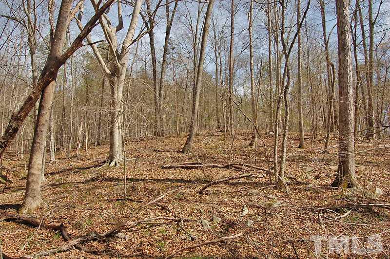 3 Huff Garrett Road Roxboro, NC 27574 - Photo 13 of 21 a view of outdoor space with wooden fence