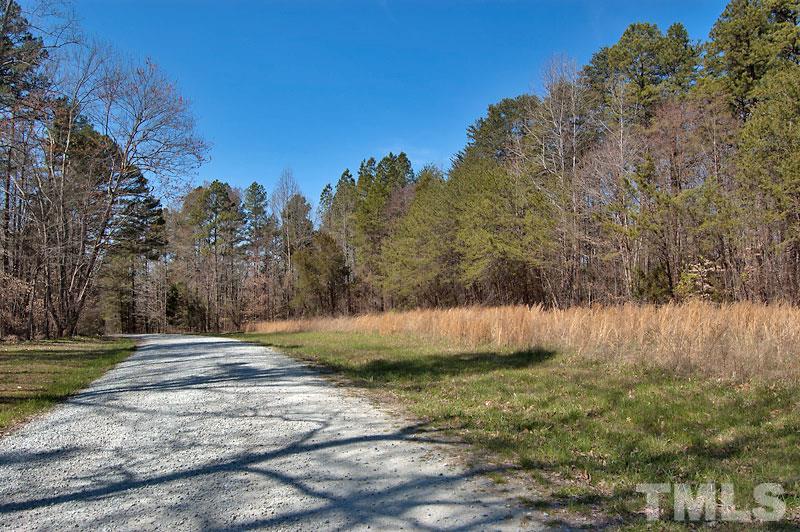 3 Huff Garrett Road Roxboro, NC 27574 - Photo 8 of 21 a view of a yard