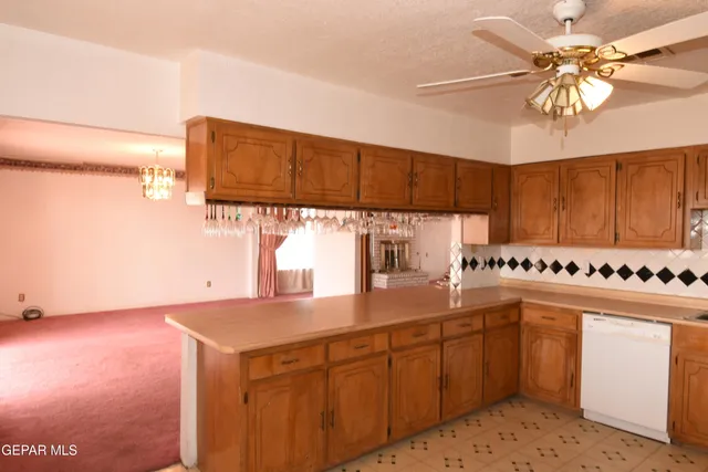 a kitchen with a stove and a cabinet