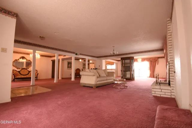 a view of a kitchen and a window