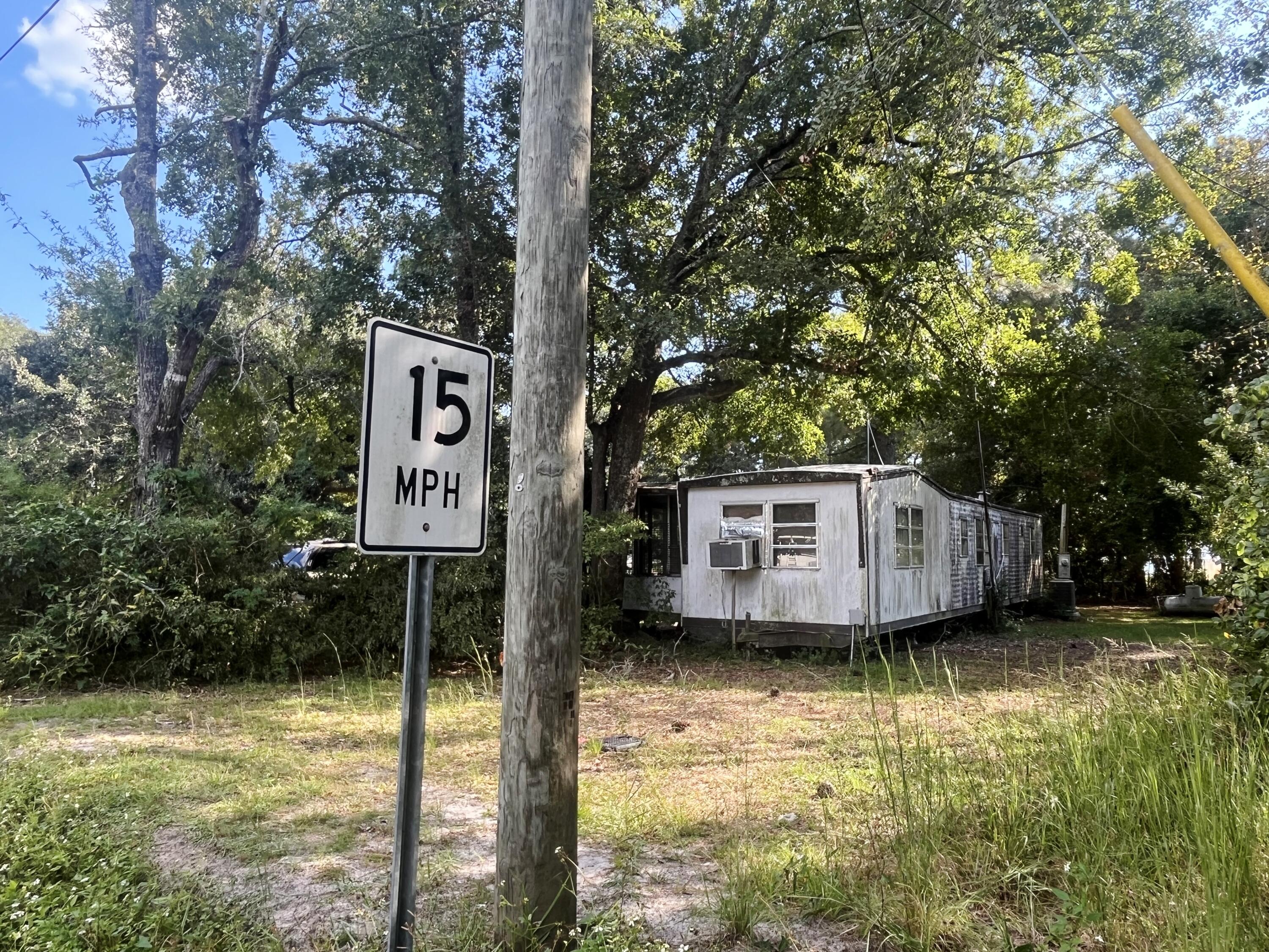 75 Hankins Road Freeport, FL 32439 - Photo 3 of 16 a view of a house with pool