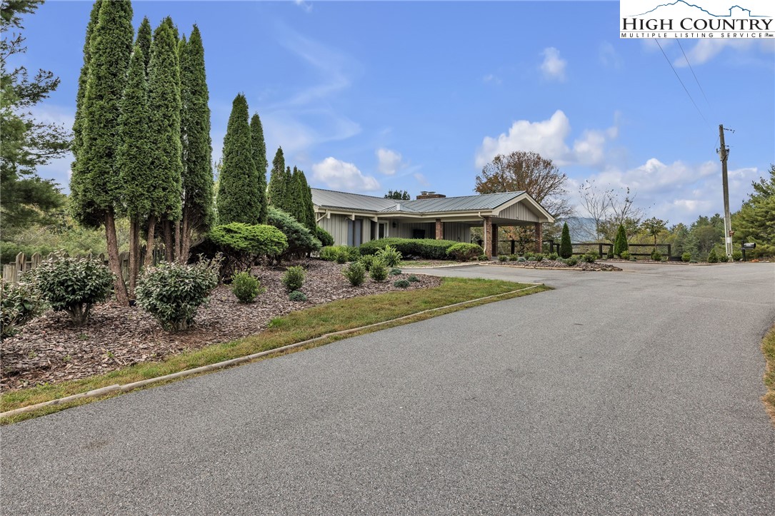 255 Clear View Ridge Crumpler, NC 28617 - Photo 2 of 33 a childrens park with lots of trees and plants