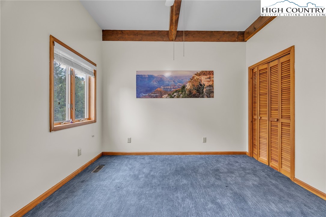 255 Clear View Ridge Crumpler, NC 28617 - Photo 22 of 33 a view of an empty room with a window