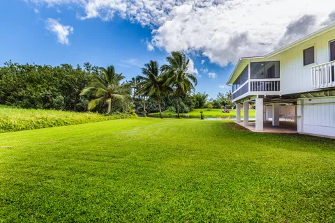 a view of a house with a big yard