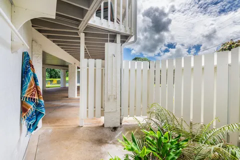 a view of a lake with beach and outdoor space