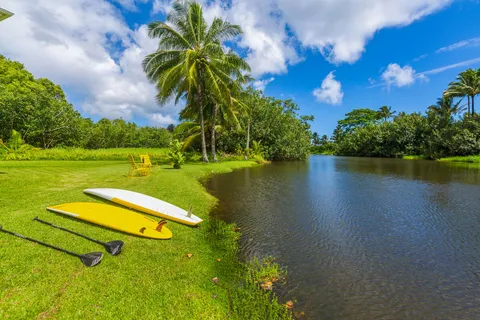 a view of a lake with a yard