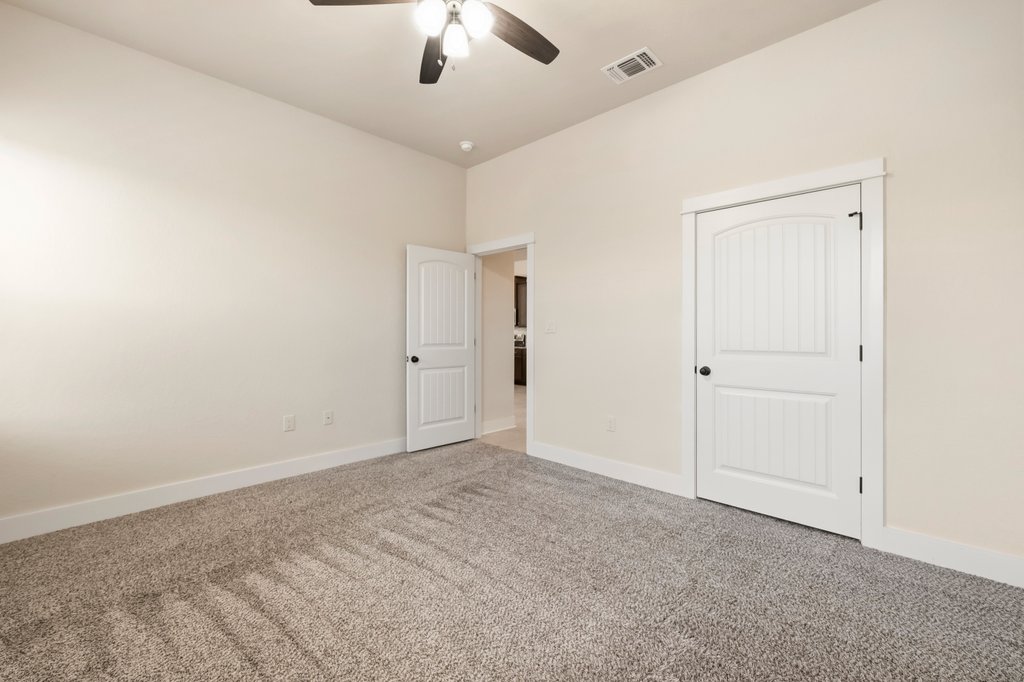 541 Stars And Stripes Fischer, TX 78623 - Photo 20 of 26 The other secondary bedroom that is spacious and soaking in natural light.