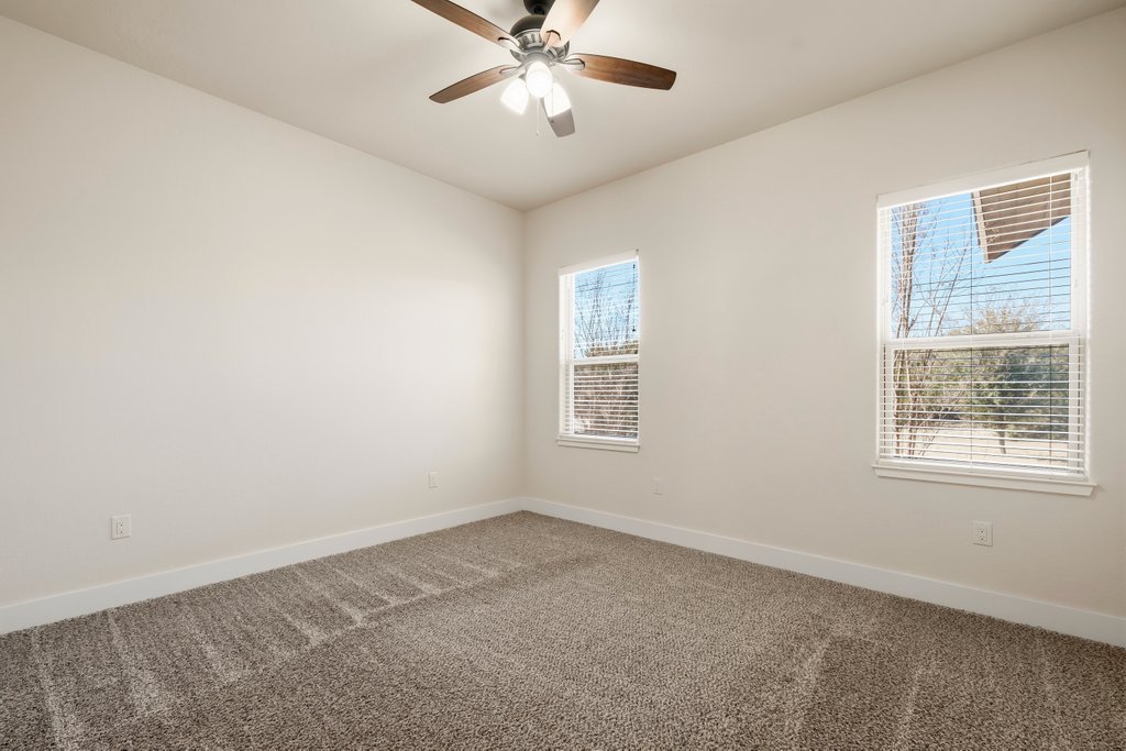 541 Stars And Stripes Fischer, TX 78623 - Photo 21 of 26 Other view of bedroom with an abundance of natural light.