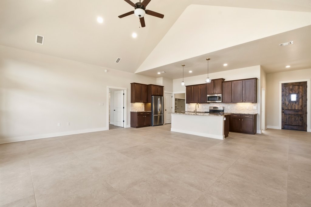 541 Stars And Stripes Fischer, TX 78623 - Photo 3 of 26 Front Door and to immediate left is the office/flex space before entering the kitchen.