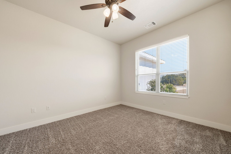 541 Stars And Stripes Fischer, TX 78623 - Photo 4 of 26 Spacious home office overlooking front of home.