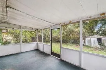 a view of front door and yard