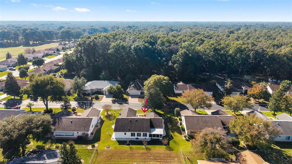 11283 Southwest 139th Place Dunnellon, FL 34432 - Photo 2 of 84 an aerial view of houses with yard