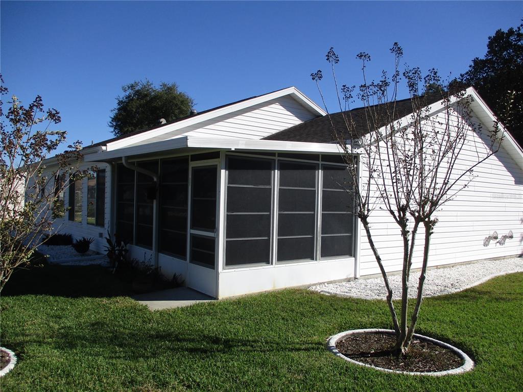 11283 Southwest 139th Place Dunnellon, FL 34432 - Photo 46 of 84 a house view with a garden space