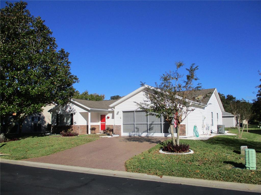 11283 Southwest 139th Place Dunnellon, FL 34432 - Photo 53 of 84 a view of white house with a yard